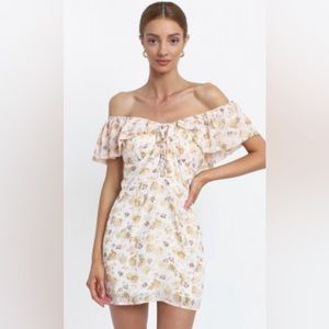Blush pink floral off the shoulder or on the shoulder short sleeve dress.